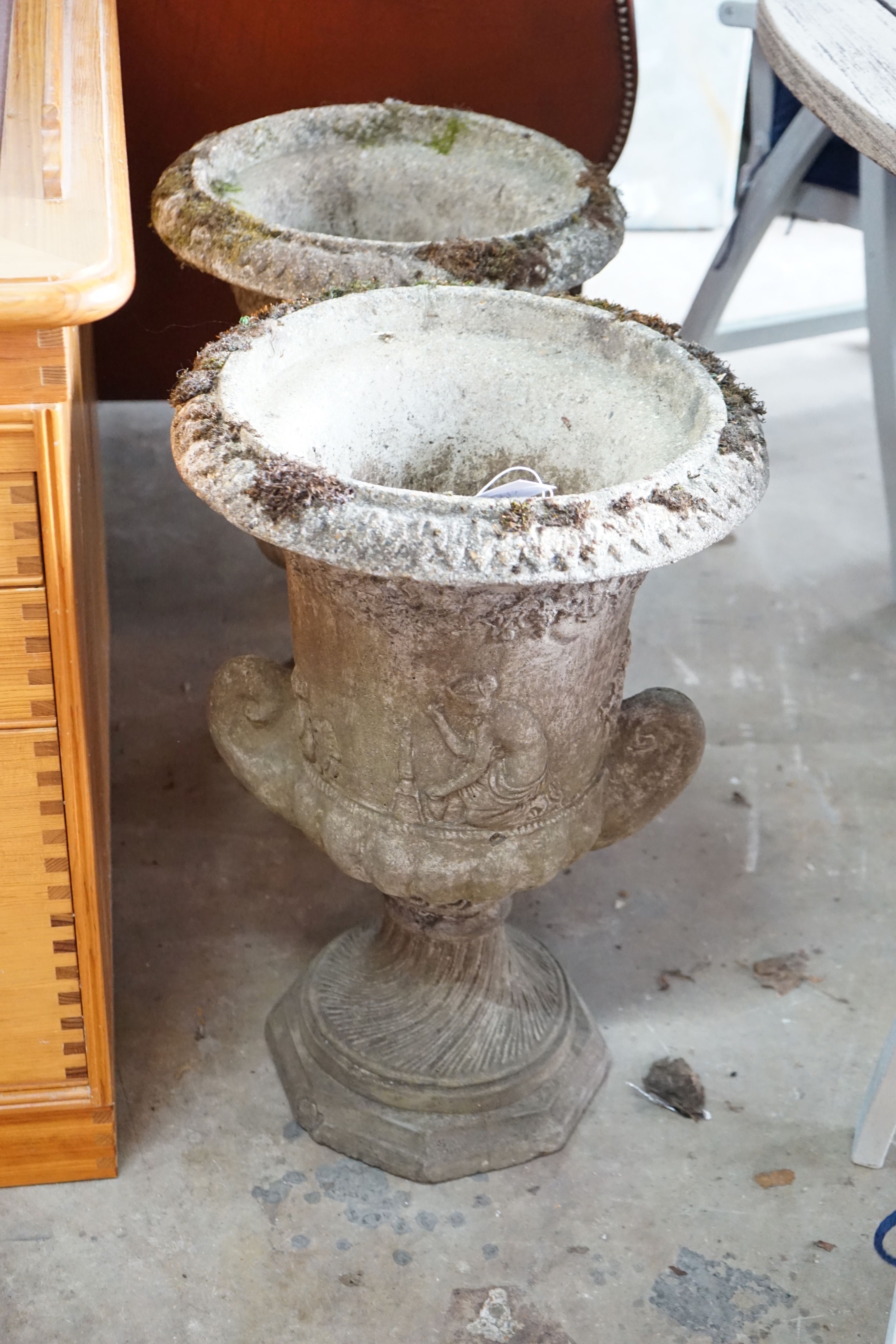 A pair of reconstituted campana garden urns, diameter 40cm, height 62cm